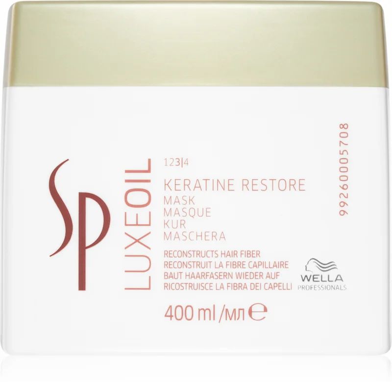 Weißer Tiegel mit goldfarbenem Deckel. Aufschrift: Keratin Restore Mask, Wella SP Luxeoil. 400 ml.