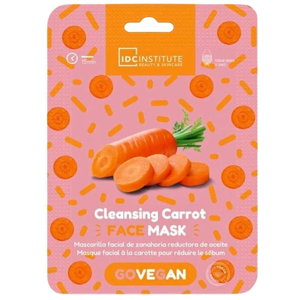 Gesichtsmaske mit Karotten-Motiv. Orangefarbene Maske mit Karotten-Illustrationen und Text. Marke: IDC Institute.