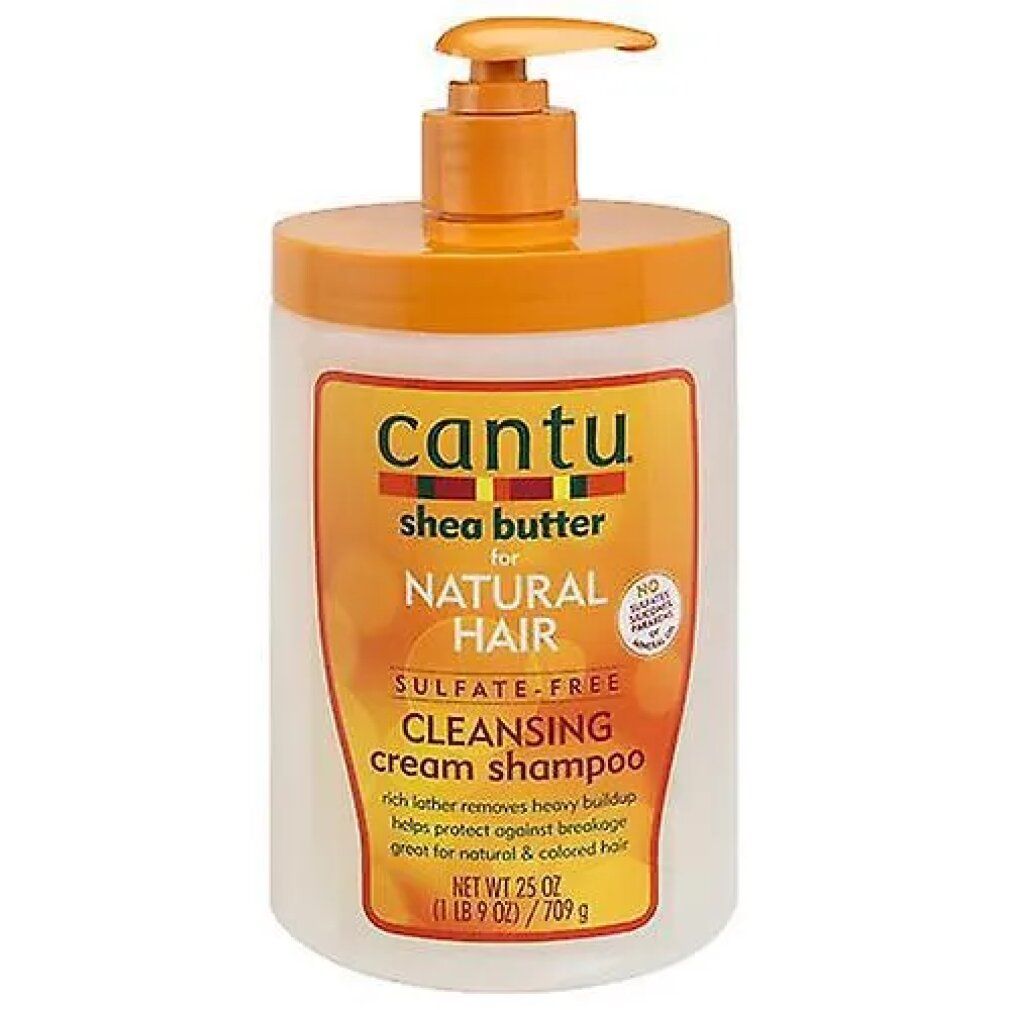 Shampoo-Flasche mit Pumpverschluss. Aufschrift: Cantu, Shea Butter, für Natural Hair, Cleansing Cream Shampoo. Orange und Weiß.