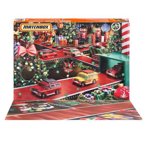 Adventskalender mit Spielzeugautos. Verpackung mit Weihnachtsmotiven, roter Fahrbahn und kleinen Autos. Marke: MATCHBOX.