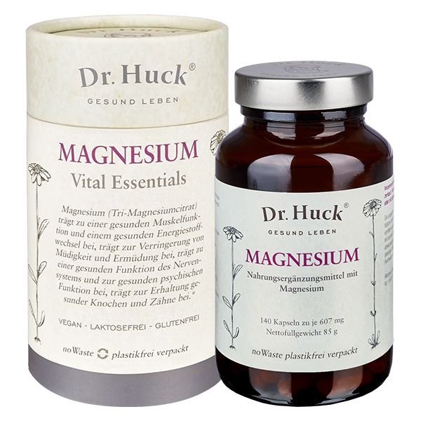 Braune Glasflasche und Pappdose mit "Dr. Huck Magnesium". Aufschrift: "140 Kapseln".