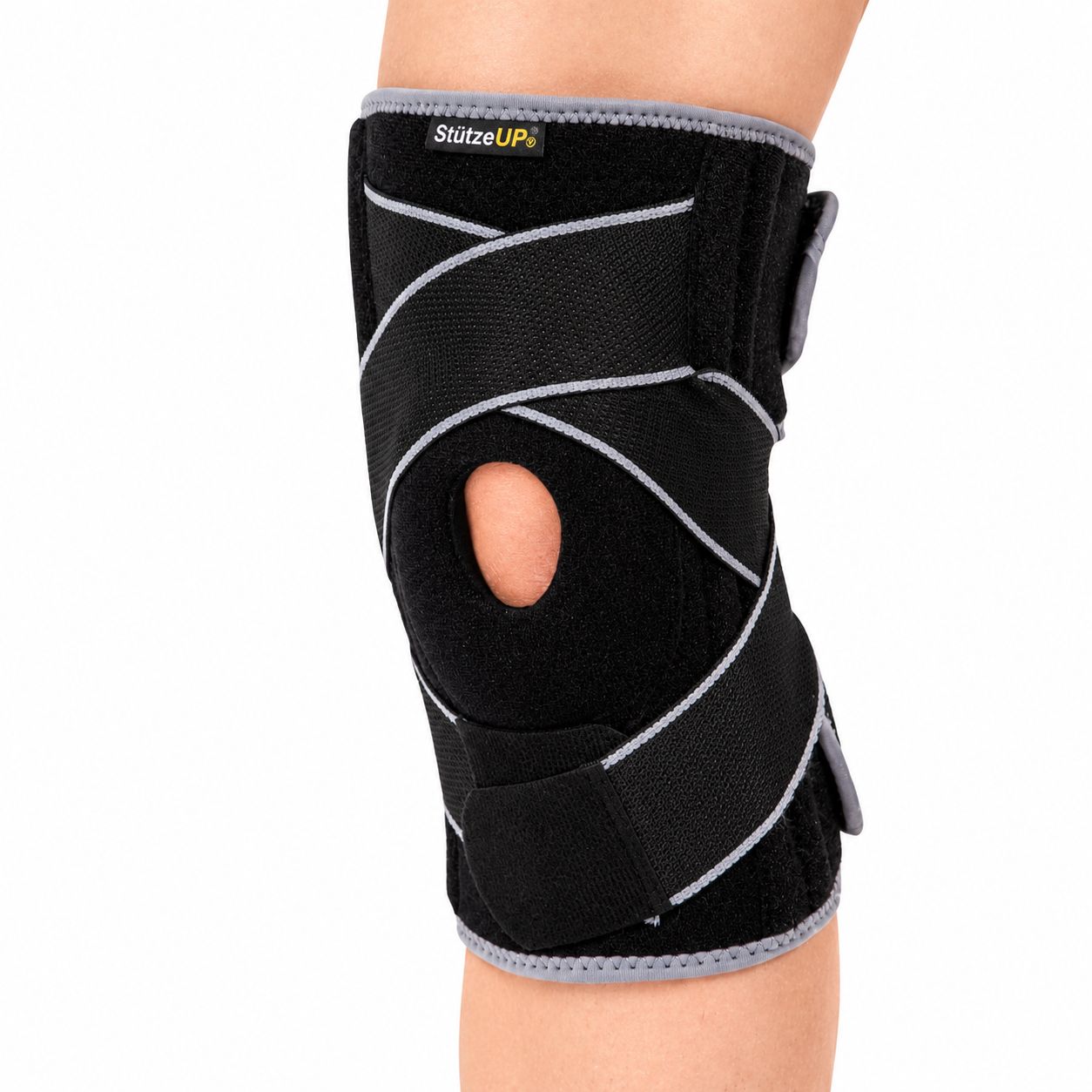 Aufgeklappte Kniebandage mit Details: Anti-Rutsch-Gel, Klettverschluss, Stoff.