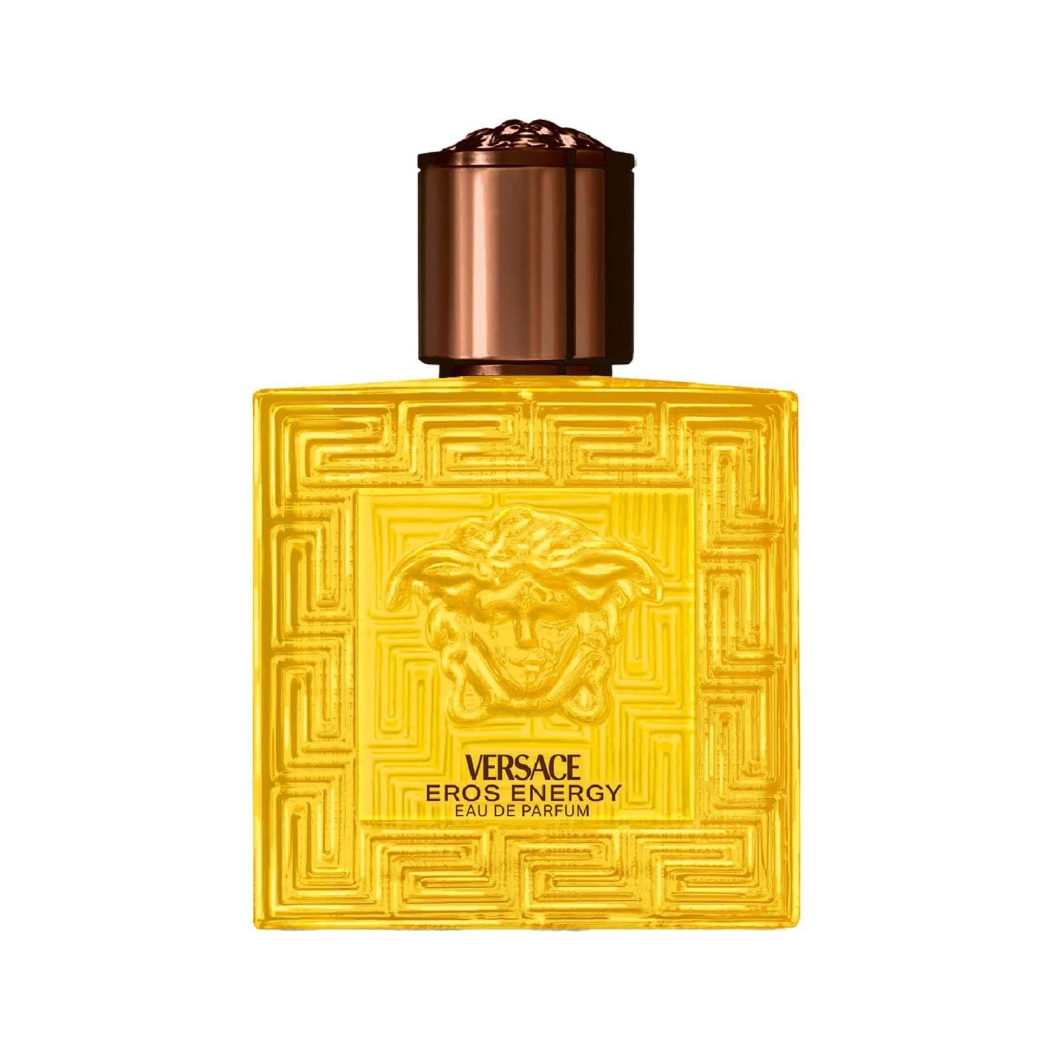 Gelbe Versace Eros Energy EdP Flasche. Quadratische Form, geprägt mit Medusa-Logo und geometrischem Muster. Brauner Verschluss.