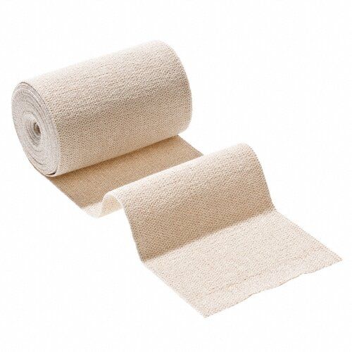 Beige Kurzzugbinde, teilweise abgerollt. Baumwollmaterial, gerollt. Textur deutlich erkennbar.