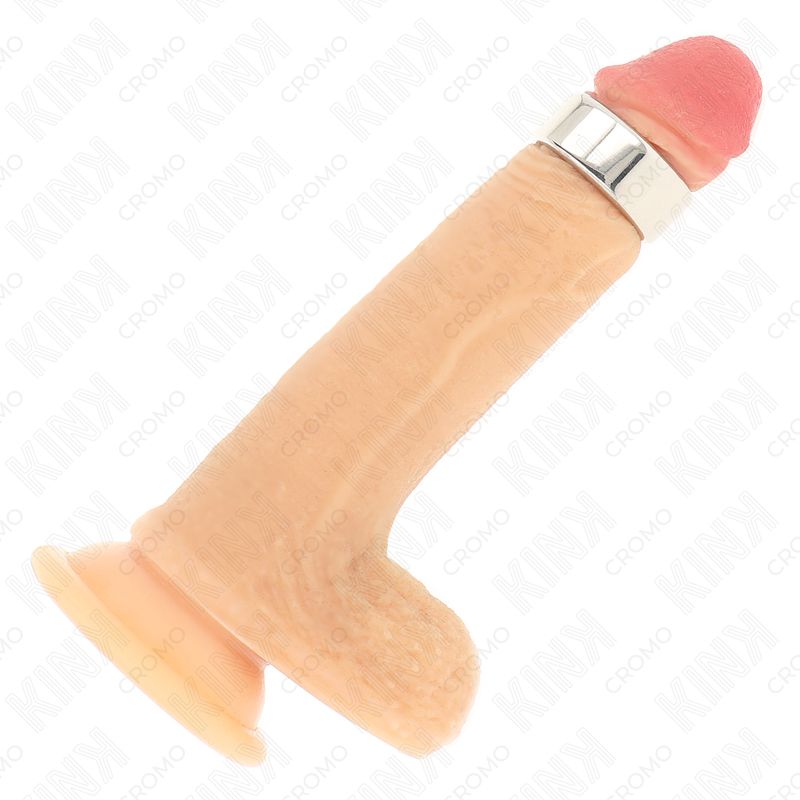 Dildo mit Metallring. Hautfarbenes Material, rosa Spitze. Basis mit Saugnapf. Kink-Logo im Hintergrund.