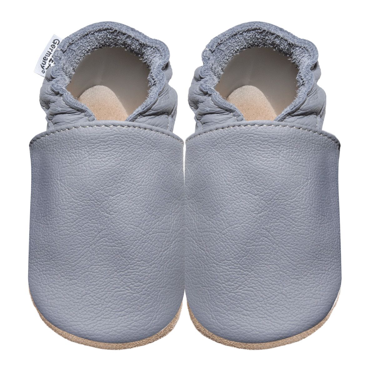 Hellgraue Babyschuhe, zwei Stück, aus Leder. Mit Gummizug am Knöchel und Etikett "HOBEA-Germany".