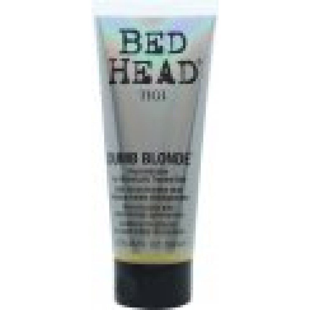 Tigi Bed Head Dumb Blonde Haarspülung. Tube mit schwarzem Verschluss. Text: Dumb Blonde, Reconstructor for Chemically Treated Hair. 200 ml.