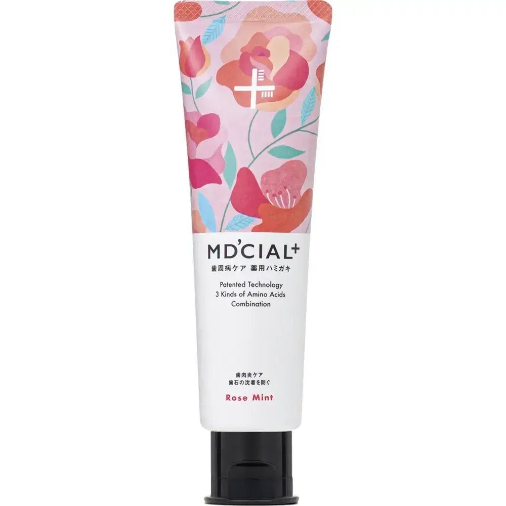 Zahnpasta-Tube mit floralem Muster. Aufschrift MD'CIAL+, Rose Mint. Schwarzer Verschluss.