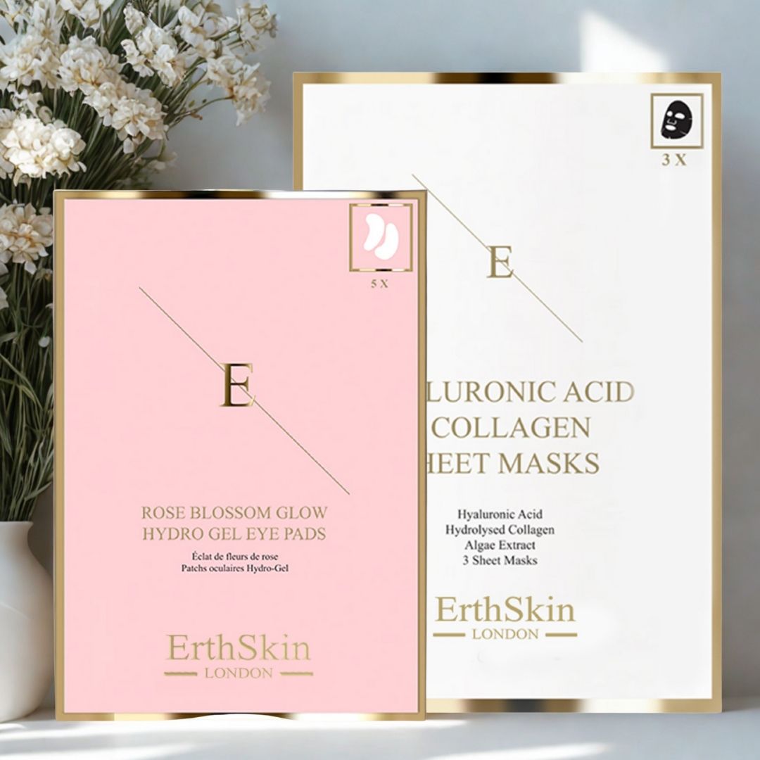 Zwei Produktverpackungen. Eine rosa Packung mit Augenpads, eine weiße Packung mit Gesichtsmasken. Beide mit Goldrahmen und dem Logo 'E' von ErthSkin London.