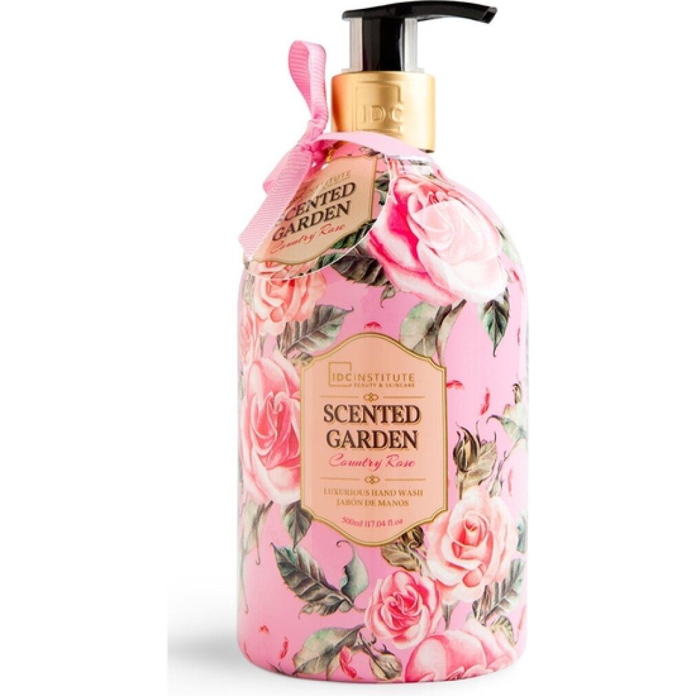 Rosa-Handseife mit Blumendekor. Flasche mit Dosierpumpe und Anhänger. Aufschrift: Scented Garden Country Rose. Marke: IDC INSTITUTE.
