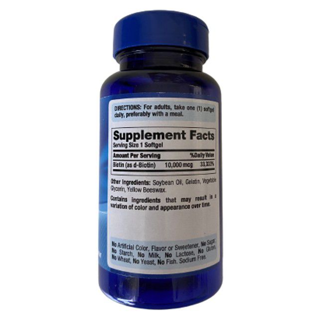 Rückseite einer blauen Flasche mit Biotin-Kapseln. Enthält Nährwertangaben und Zutatenliste. Keine künstlichen Zusätze.