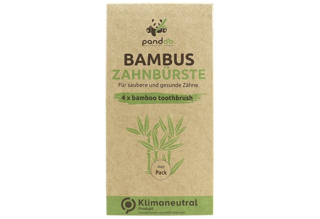 Zahnbürsten-Packung. Bambus-Zahnbürsten, 4er Pack. Verpackung aus braunem Karton mit Produktinformationen und Logo.