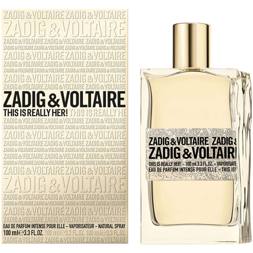 Parfümflasche und Schachtel. Aufschrift: ZADIG & VOLTAIRE THIS IS REALLY HER. Goldfarbener Verschluss, rechteckige Flasche.