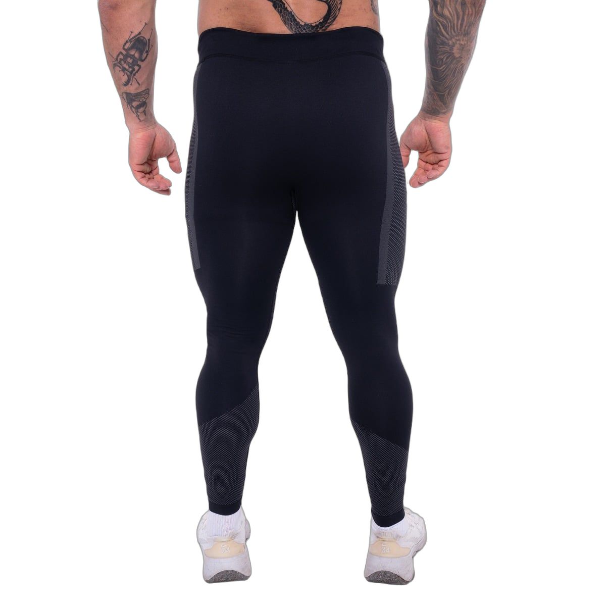 Rückansicht Herren-Leggings, schwarz/grau, nahtlos, mit dunkleren Zonen an den Seiten und Waden.