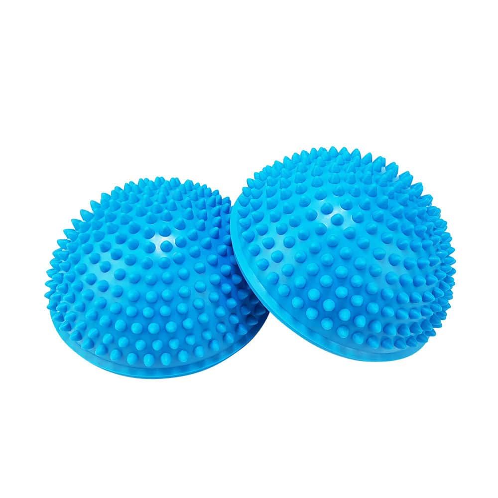 Zwei türkisfarbene Balance Pods. Halbkugelförmig mit Noppen. Für Fitness- und Gleichgewichtsübungen.