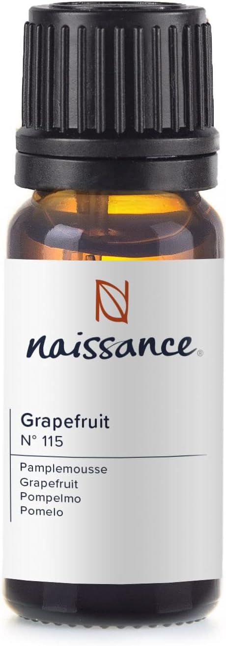 Braune Glasflasche mit schwarzem Deckel. Etikett: Naissance, Grapefruit, Nr. 115. Mehrsprachiger Text.
