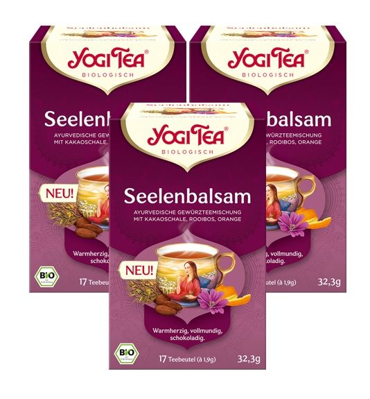 Drei Packungen Yogi Tea Seelenbalsam. Lila Verpackung mit Logo und Produktbezeichnung. Bio-Siegel und "NEU!" Aufdruck.