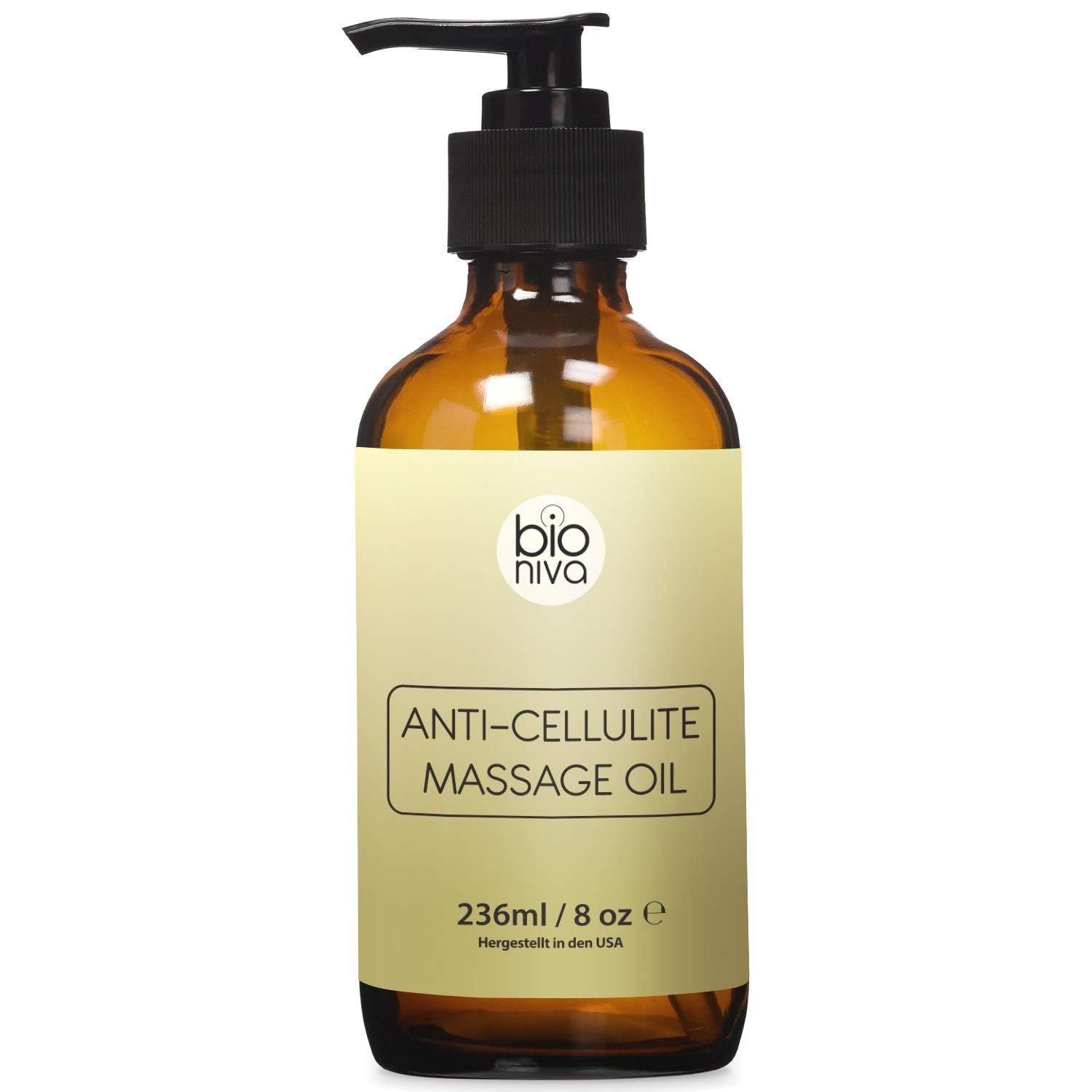 Braune Glasflasche mit schwarzem Pumpverschluss. Etikett mit "Anti-Cellulite Massage Oil" und "bio niva" Logo.