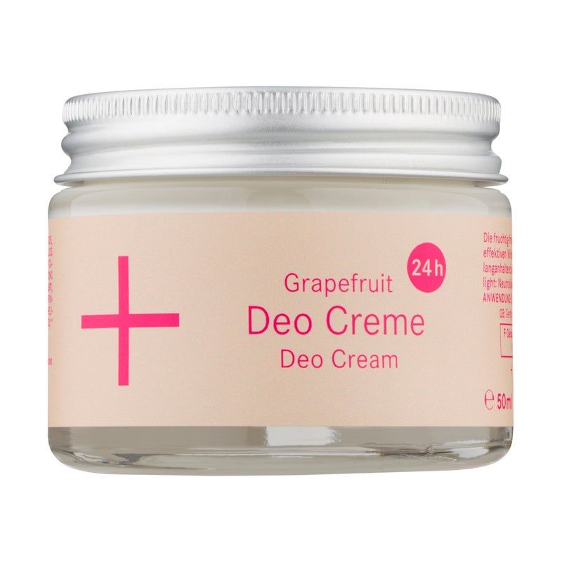 Glasbehälter mit Schraubverschluss. Aufschrift: Grapefruit Deo Creme, 24h. Rosa Pluszeichen links.
