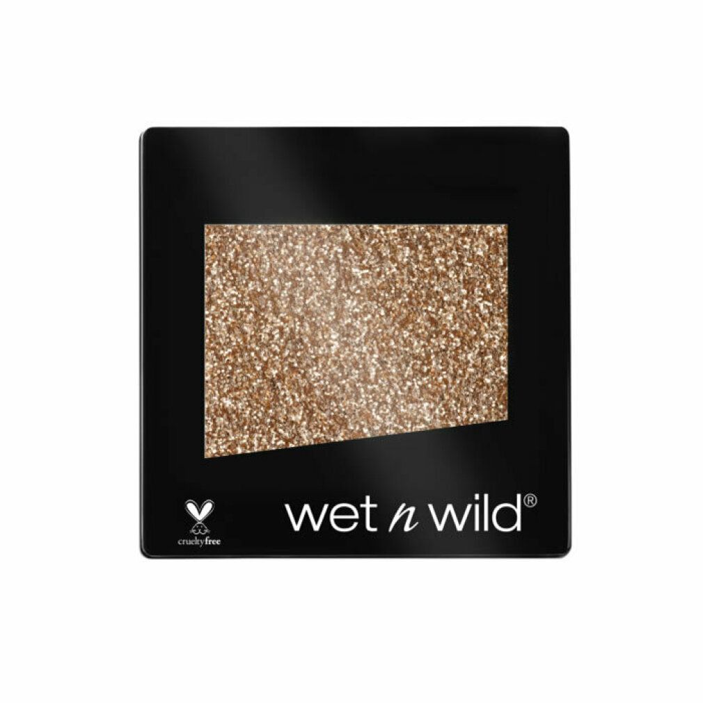 Goldfarbener Glitzer-Lidschatten in quadratischer, schwarzer Verpackung. Mit "wet n wild" und Cruelty Free Logo.