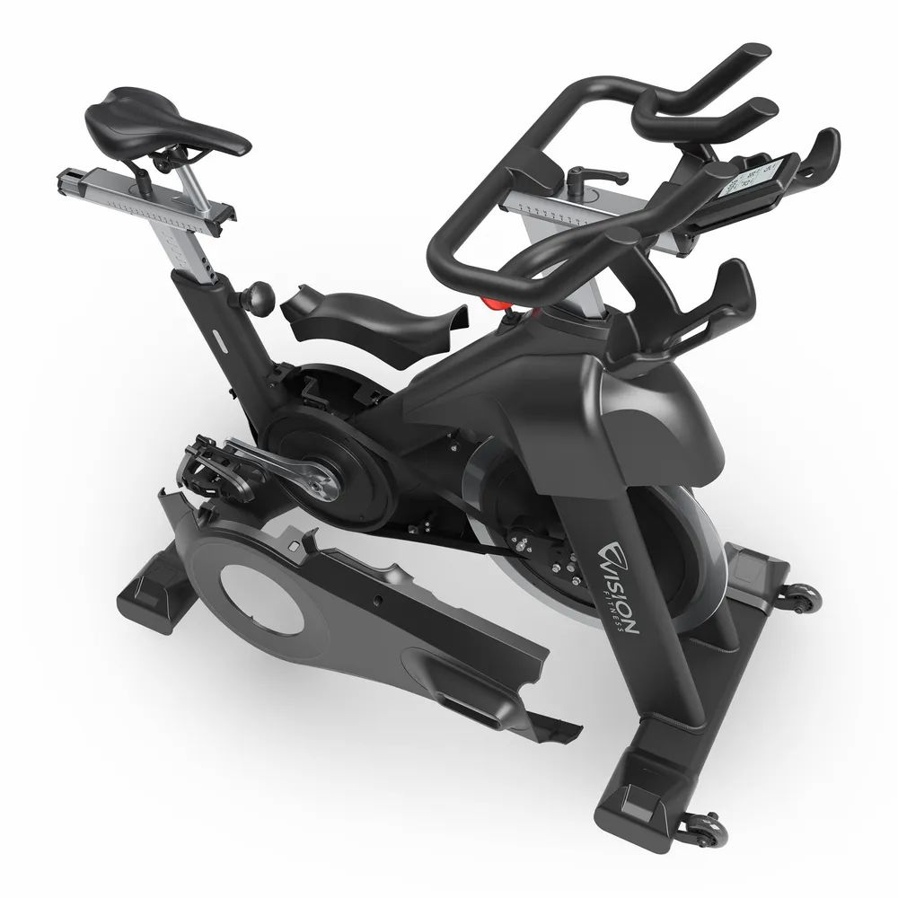 Indoor Cycle mit abgenommenen Abdeckungen. Sichtbar: Schwungrad, Pedale, Rahmen und Vision-Logo.