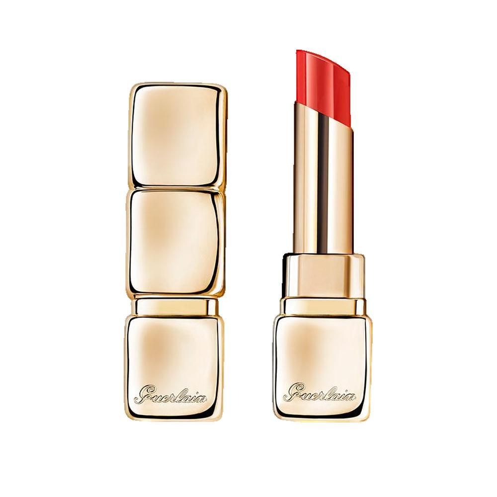 Lippenstift in goldfarbener Hülle, geöffnet. Roter Lippenstiftstift sichtbar. Marke Guerlain.