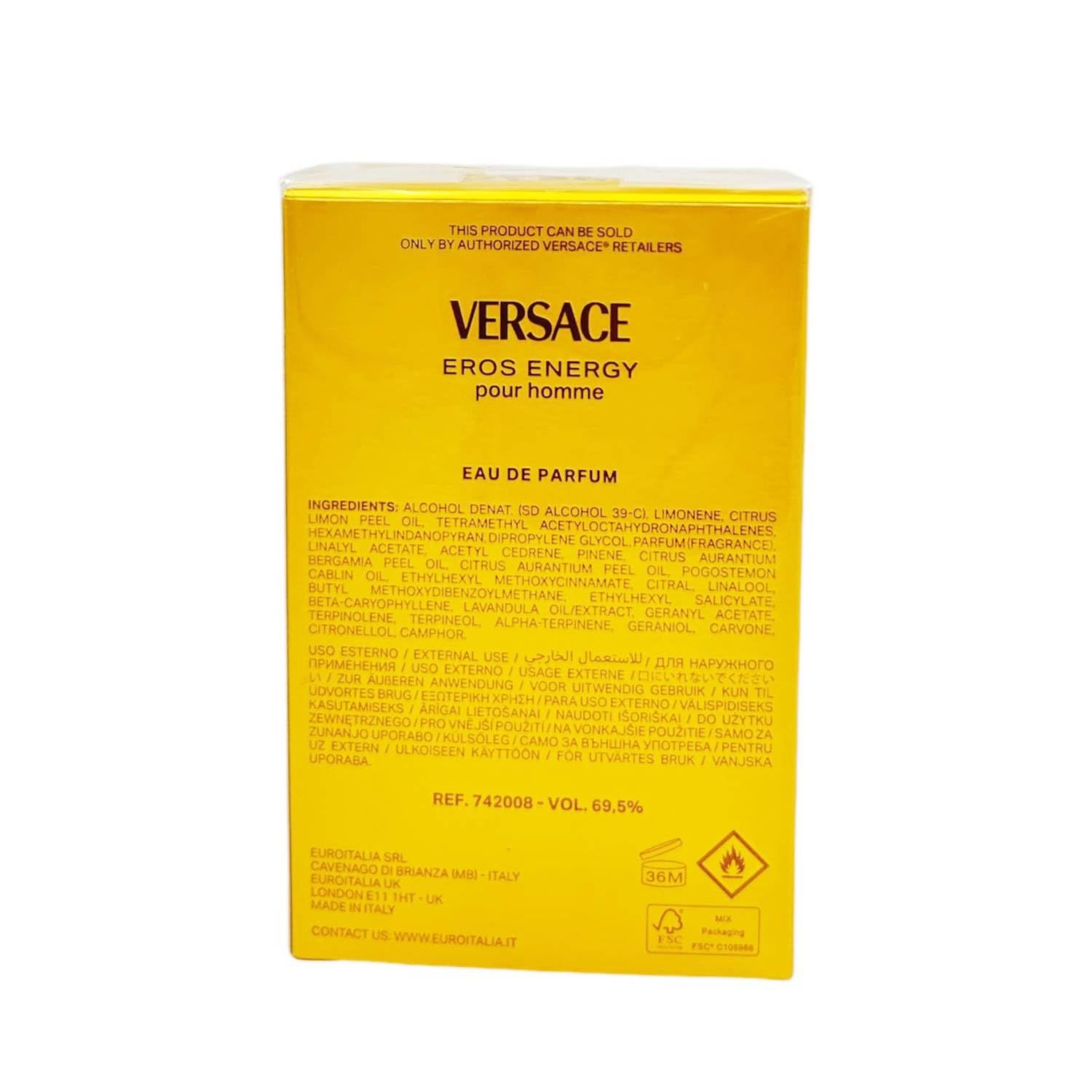 Rückseite der Versace Eros Energy EdP Verpackung. Gelber Karton mit Text und Inhaltsstoffen. Produktname und Marke.