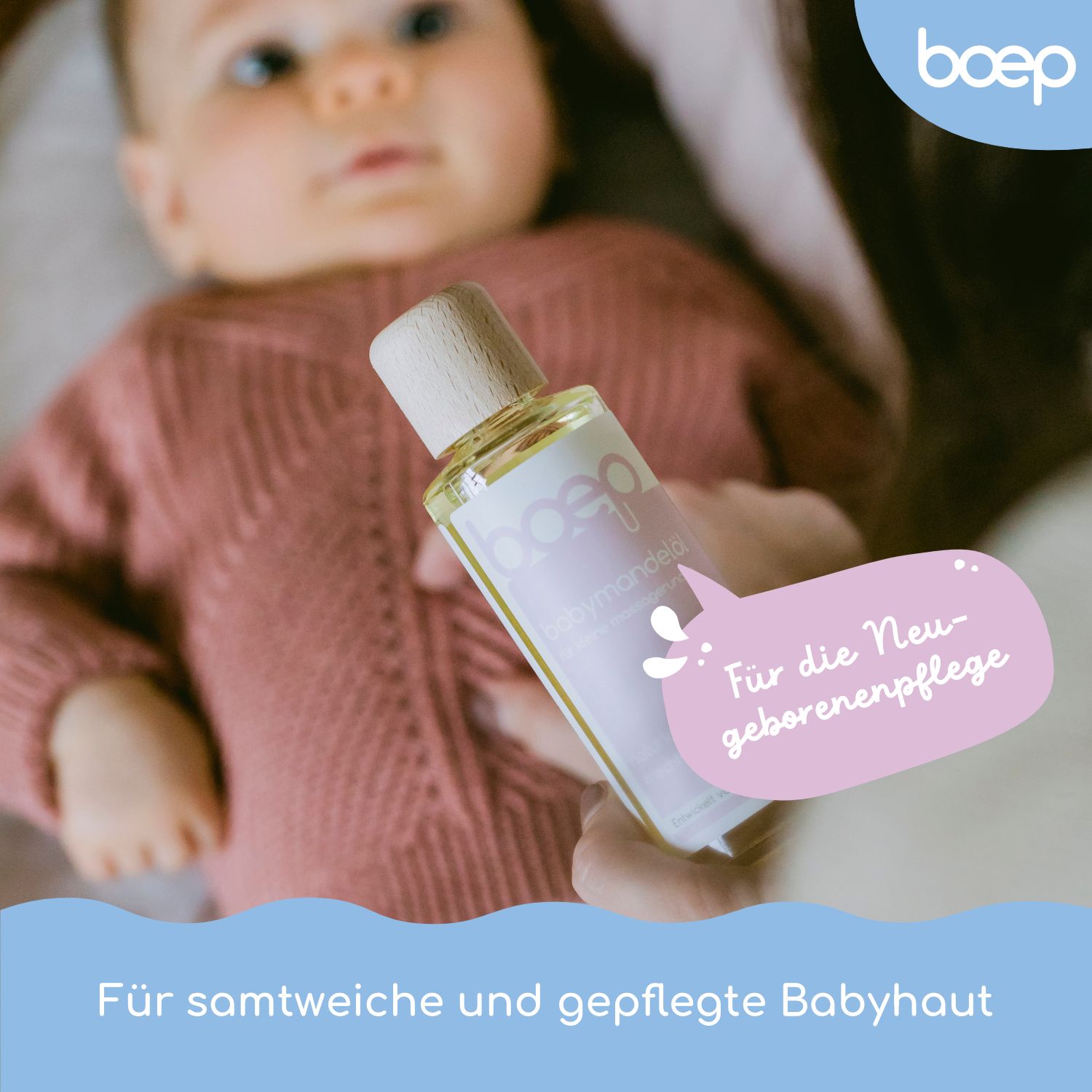 Baby wird gehalten, Flasche Babymandelöl. Logo: boep. Text: Für die Neugeborenenpflege. Für samtweiche Babyhaut.