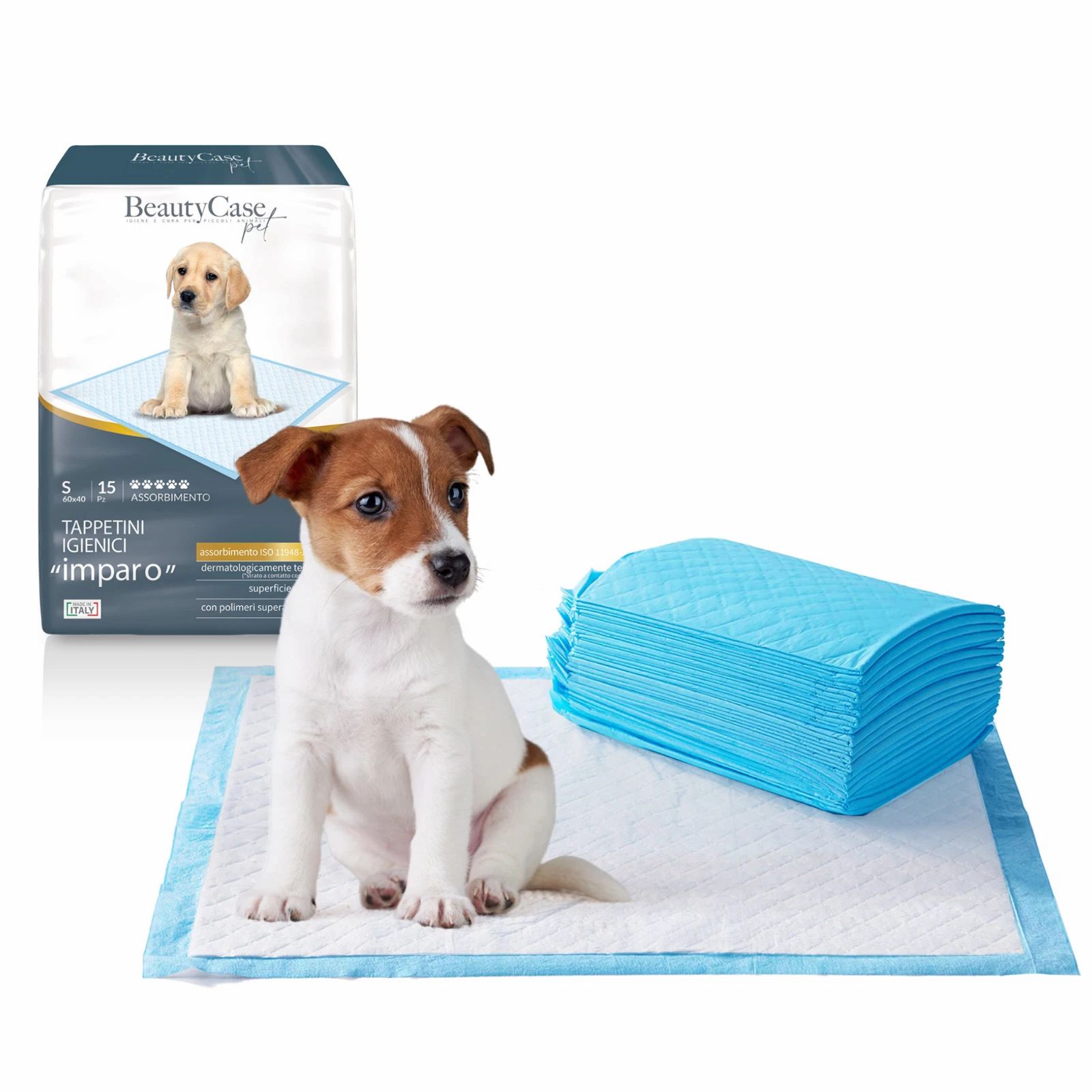 Hundewelpe sitzt auf einer blauen Matte. Daneben eine Packung und ein Stapel blauer Matten. Auf der Packung ist ein Welpe abgebildet.