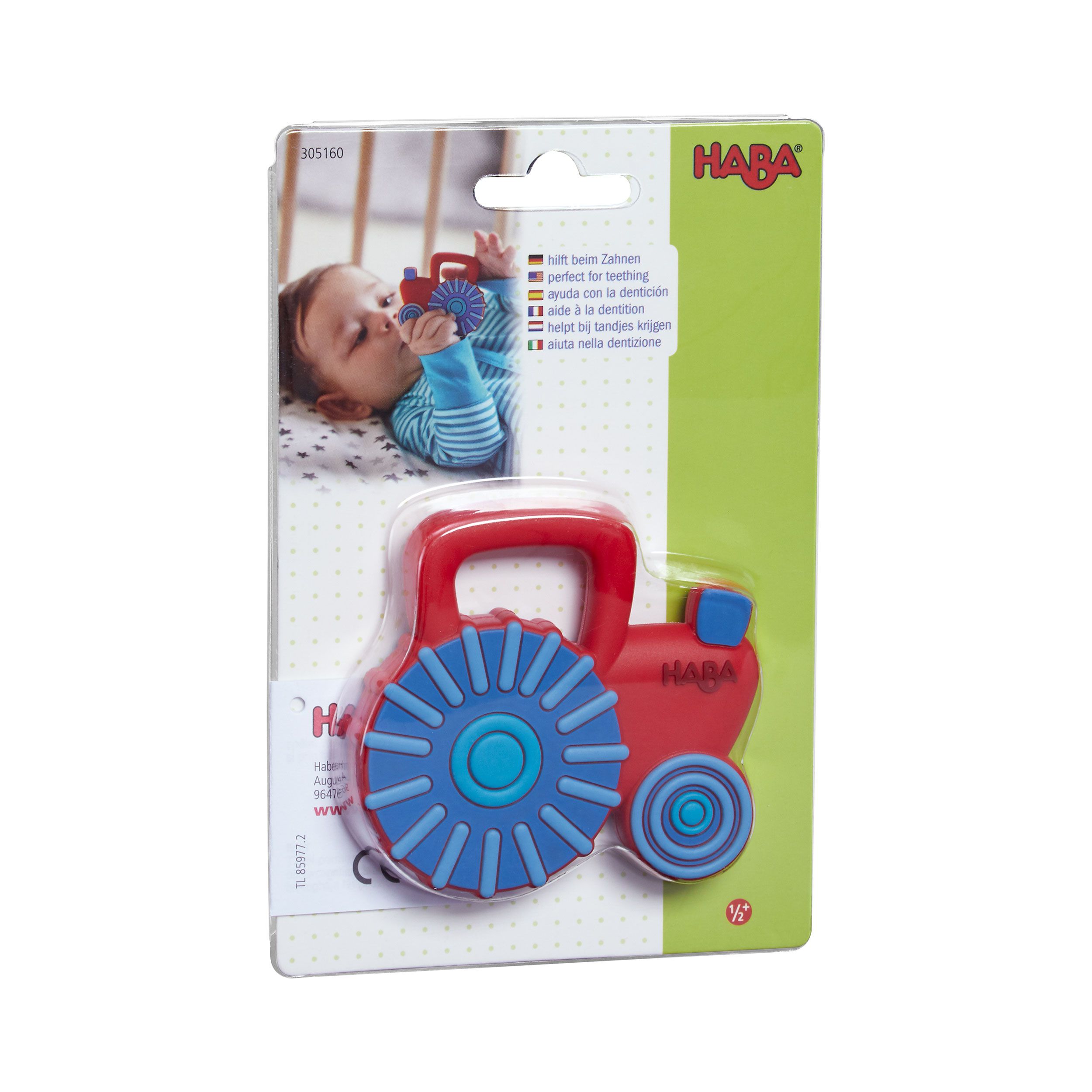 Verpackung mit rotem Traktor-Greifling. Oben links ein Baby, das den Greifling benutzt. HABA-Logo.