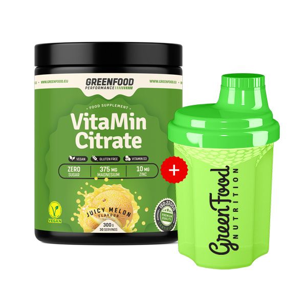 Grünes Nahrungsergänzungsmittel mit Shaker. Dose mit "VitaMin Citrate" und "Juicy Melon" Schriftzug. Shaker mit "GreenFood Nutrition" Schriftzug.