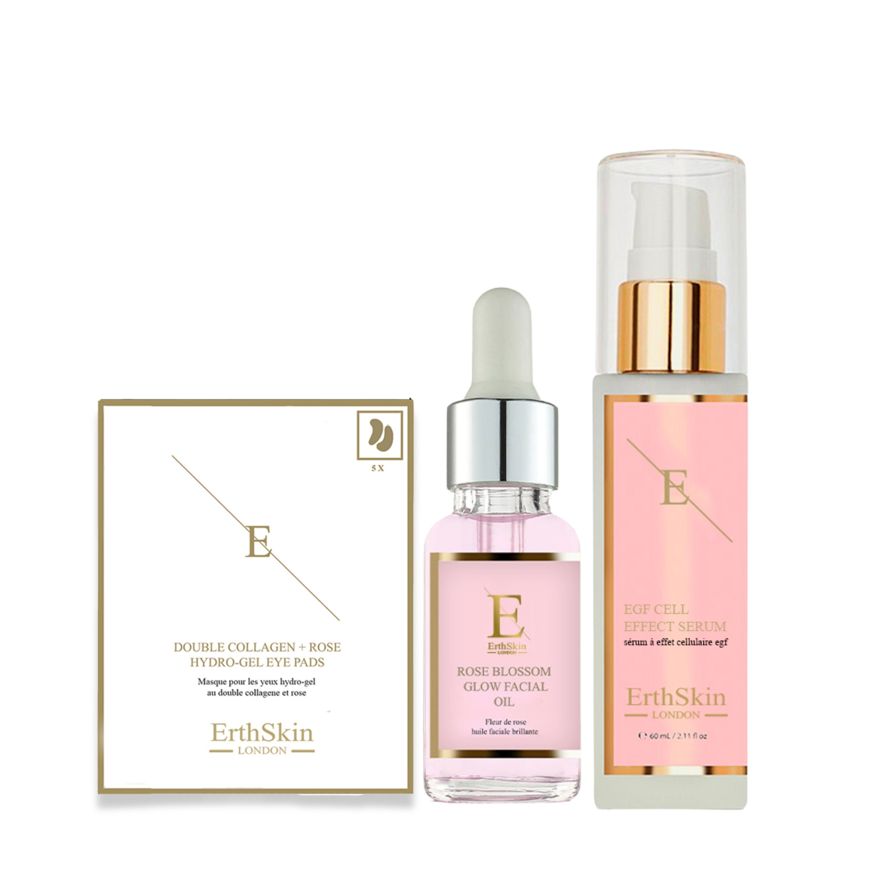 Drei ErthSkin London Produkte: Serum, Gesichtsöl und Augenpads. Rosa Etiketten, silberne und goldene Akzente. Sichtbare Schriftzüge.