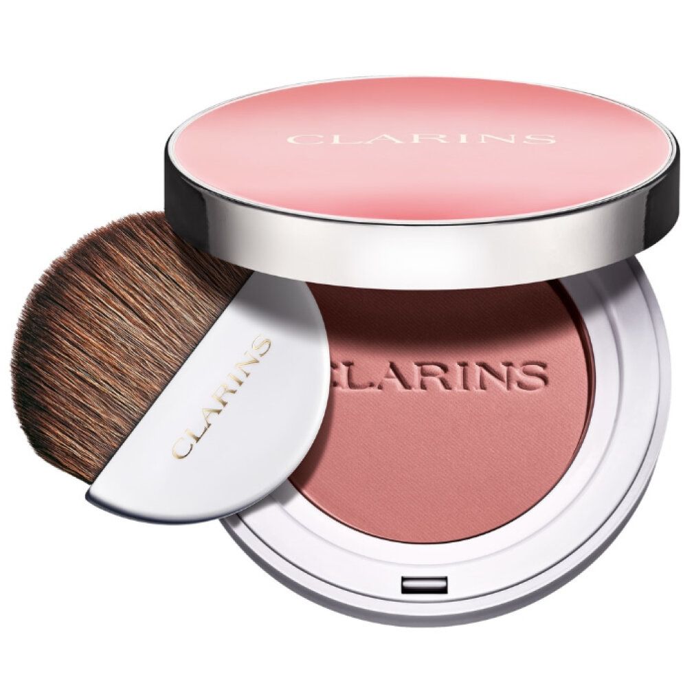 Runder Rouge-Kompaktpuder mit Pinsel. Deckel mit Schriftzug CLARINS. Puder in Rosa. Pinsel mit weißem Griff. Aufschrift CLARINS.