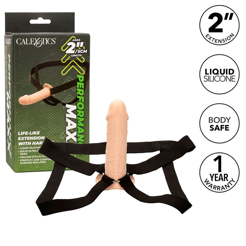 Harness-Penisverlängerung mit Verpackung. Schwarzer Harness, beigefarbene Verlängerung. Verpackung mit Produktname, 2" Verlängerung, und Logos.