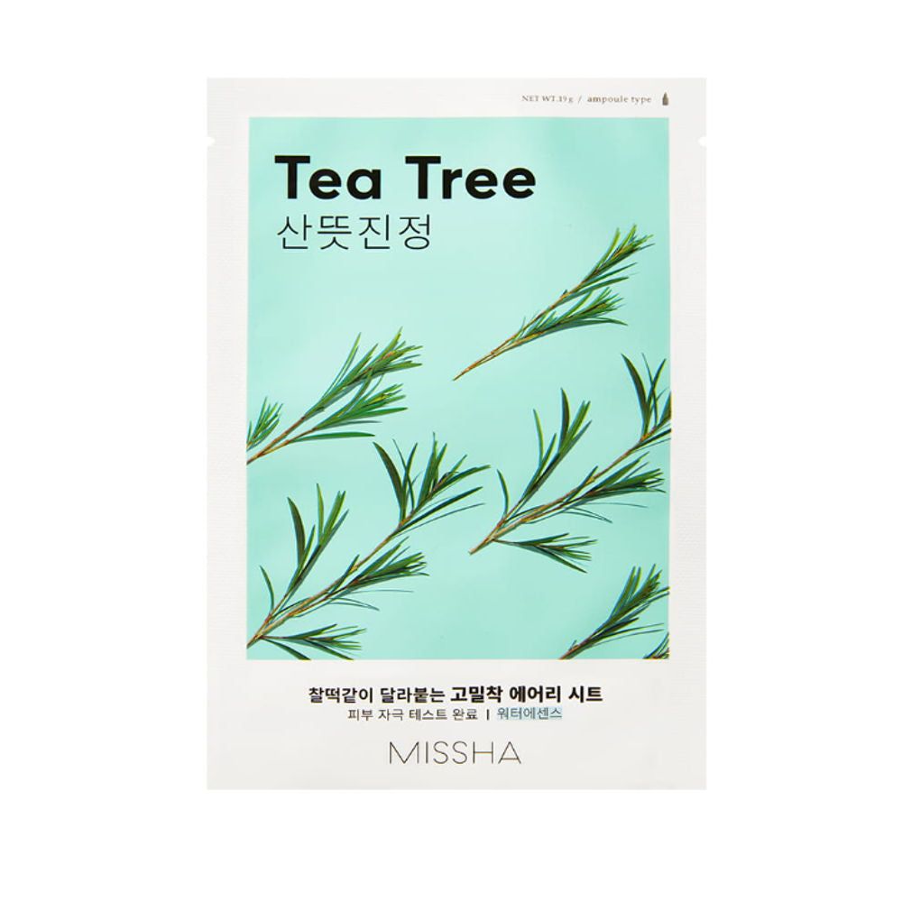Weiße Verpackung mit grünem Hintergrund und Teebaum-Motiv. Text: Tea Tree, koreanische Schriftzeichen, MISSHA.