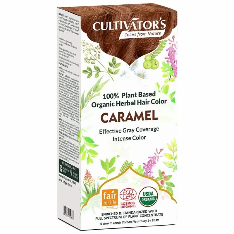 Karton mit Pflanzenhaarfarbe „Karamell“. Aufschrift: „CULTIVATOR'S“, „100% Plant Based Organic Herbal Hair Color“. Logos: Fair for Life, Cosmos Organic, USDA Organic.
