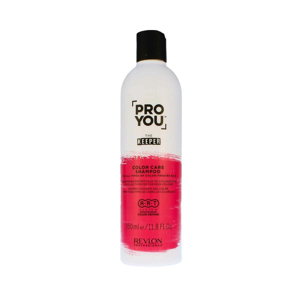 Weiße Flasche mit schwarzem Deckel. Aufschrift: Pro You The Keeper Color Care Shampoo. Rosa Farbband. Revlon Professional.