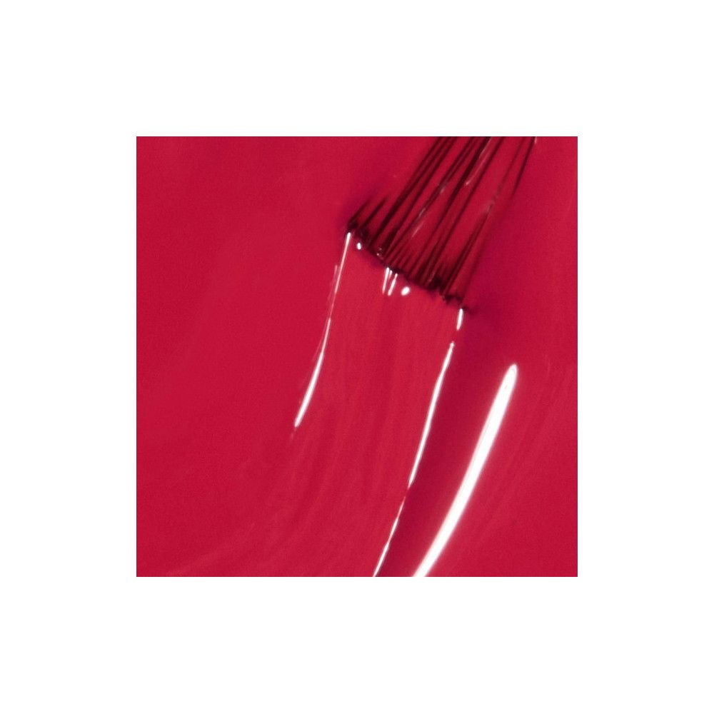 Nagellack-Applikator mit roter Farbe. Nahaufnahme, zeigt die Textur und den Farbton.