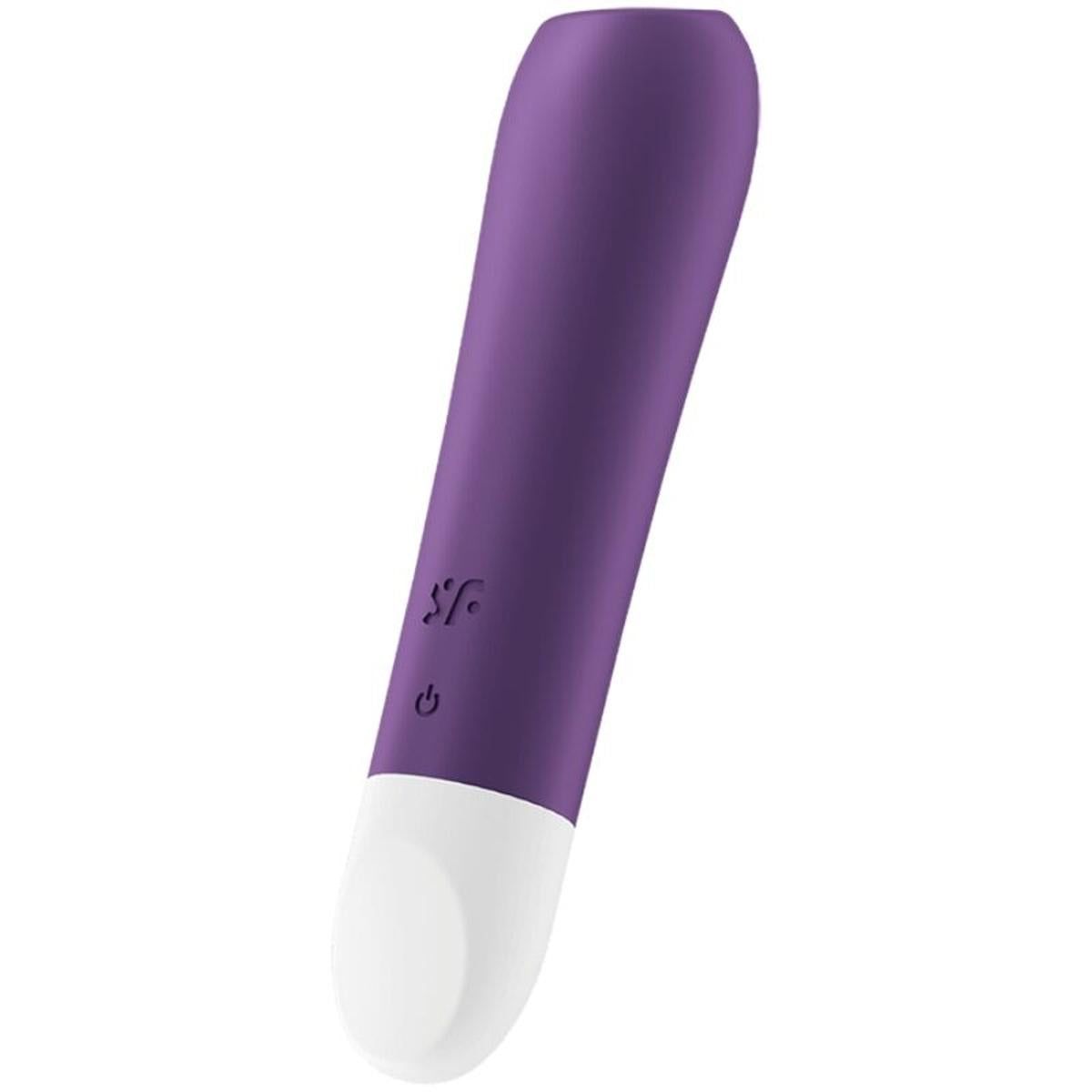 Lila Vibrator mit weißer Spitze. Mit Logo und Ein-/Ausschalter. Schlanke, längliche Form.