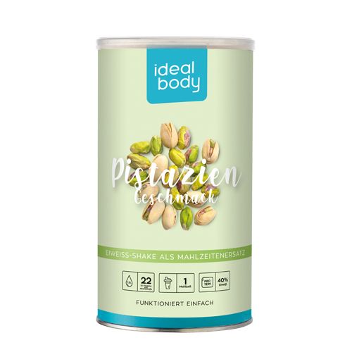Grüne Dose mit "Ideal Body"-Logo und Pistazien-Abbildung. Text: "Pistazien Geschmack", "Eiweiß-Shake als Mahlzeitenersatz".