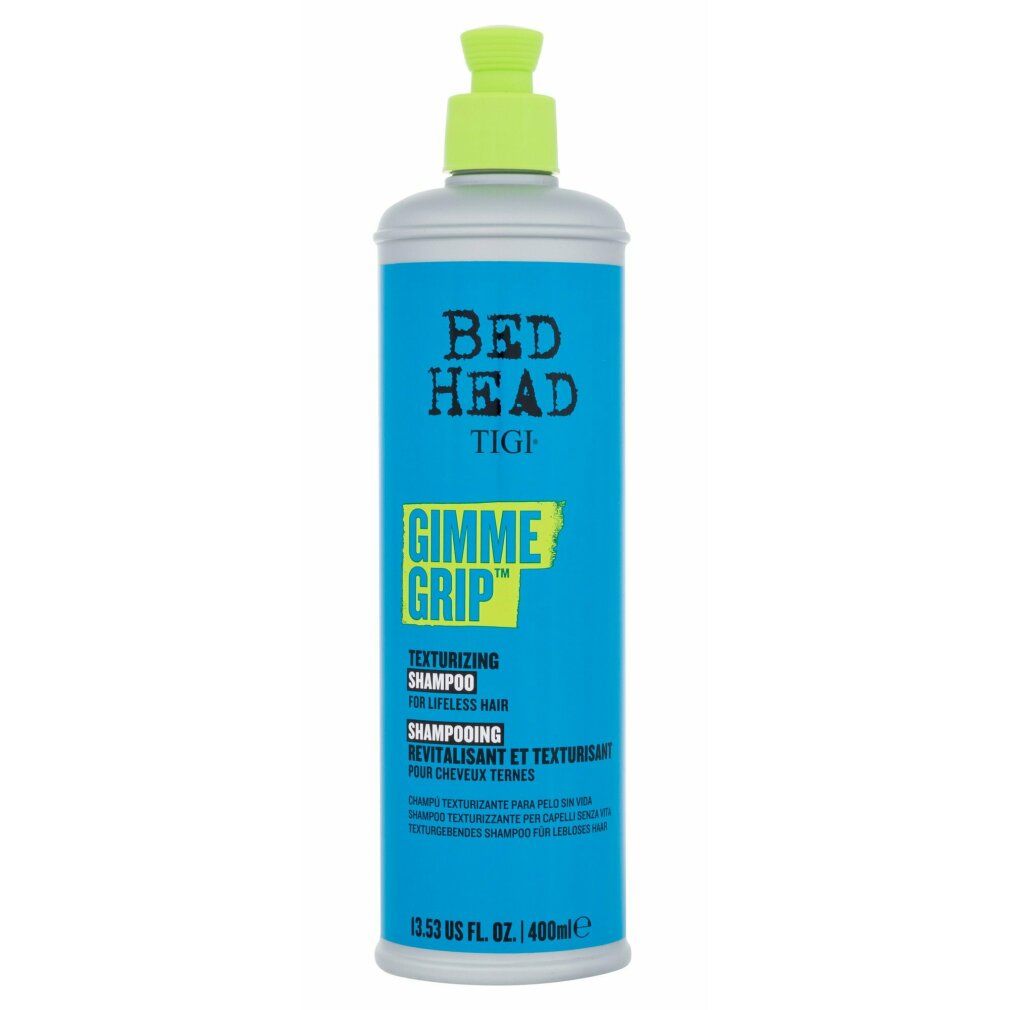 Türkis-farbene Shampoo-Flasche mit grünem Deckel. Aufschrift: Bed Head TIGI Gimme Grip Texturizing Shampoo.