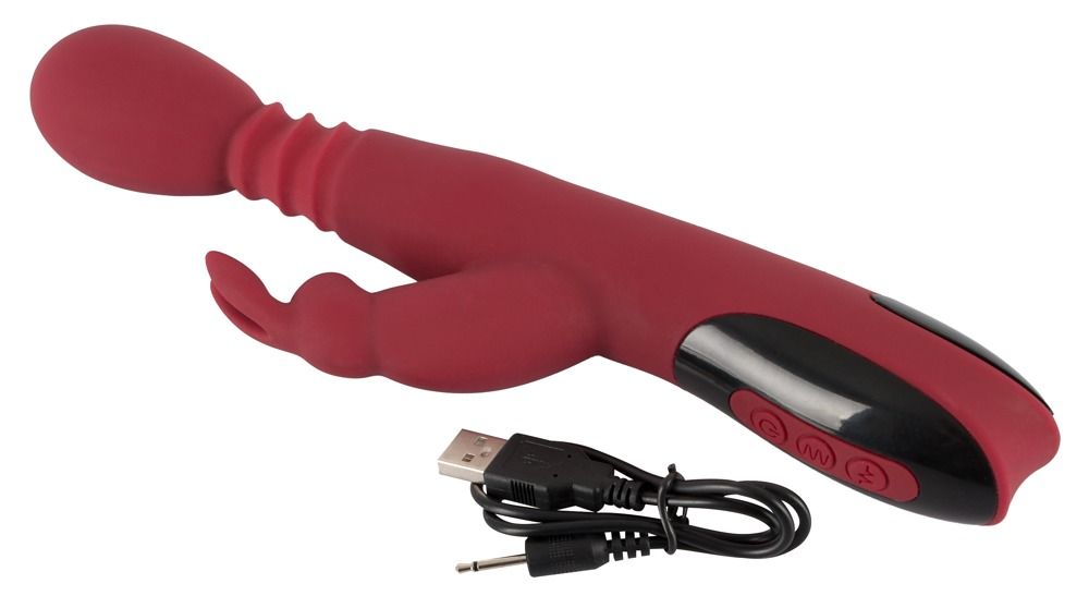 Roter Vibrator mit Kaninchenohren, Bedienfeld und Ladekabel. USB- und Klinkenstecker.