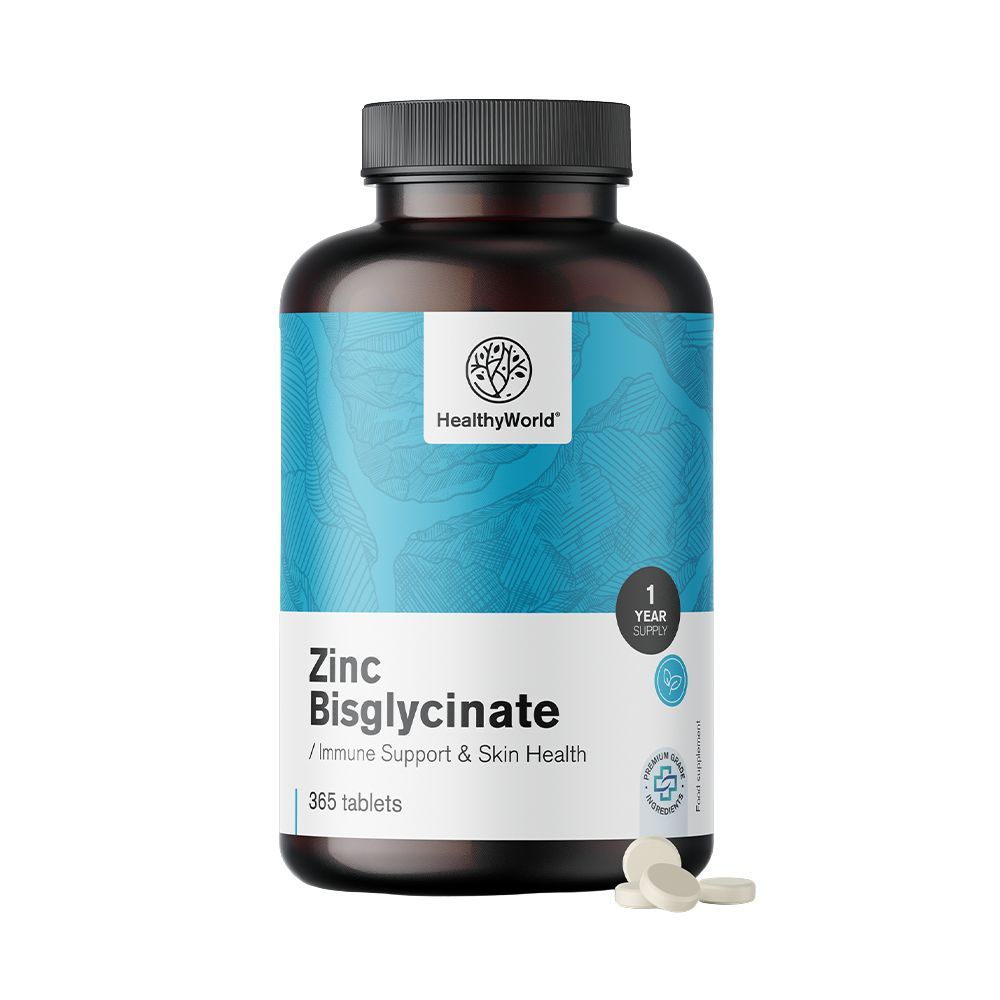 Braune Flasche mit Tabletten. Aufschrift: HealthyWorld, Zink Bisglycinat, 365 Tabletten. Einige Tabletten liegen daneben.