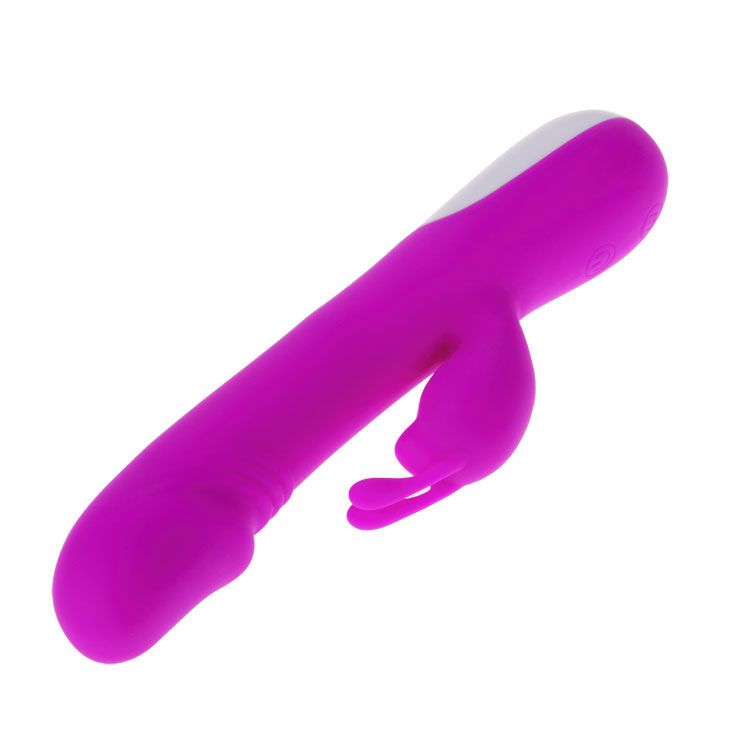 Lila Vibrator mit Klitoris-Stimulator. Weißer Akzent am unteren Ende. Auf weißem Hintergrund.