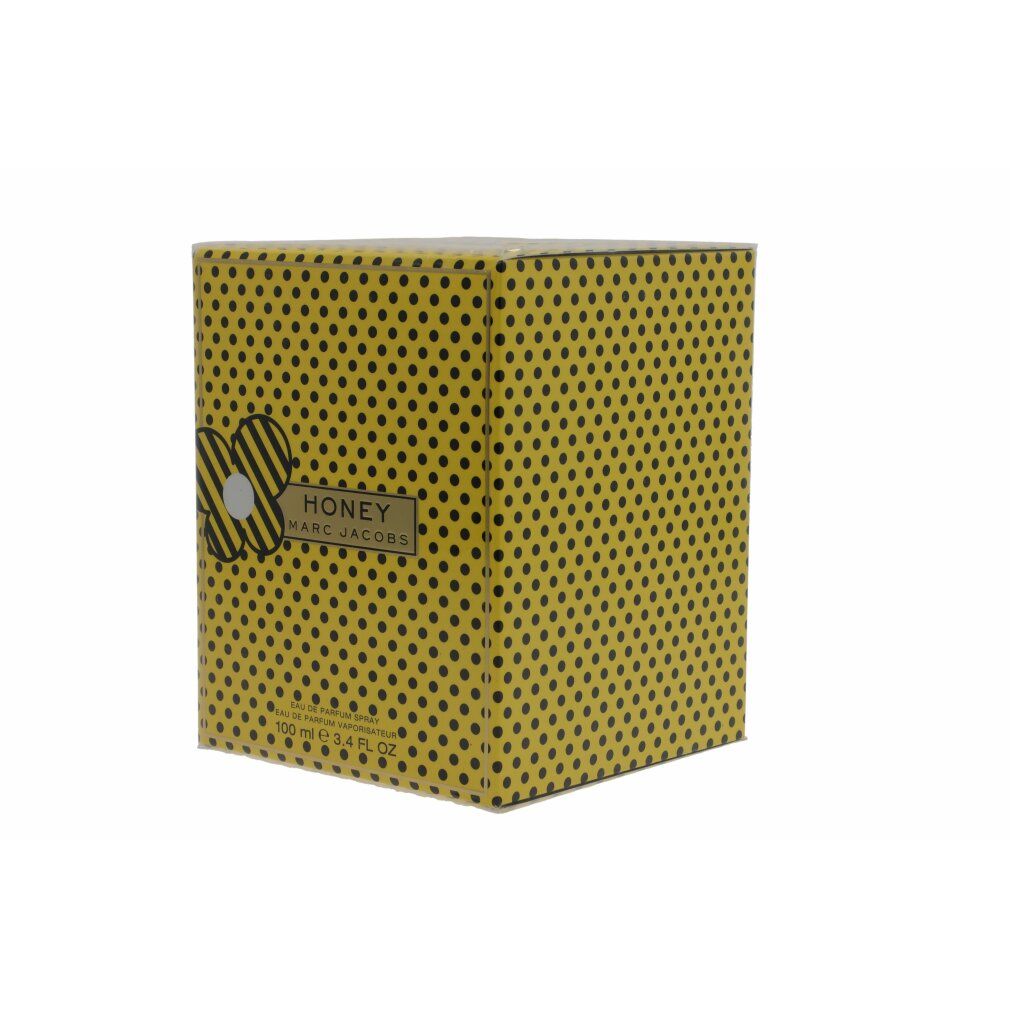 Gelbe Schachtel mit schwarzen Punkten. Aufschrift "HONEY" und "MARC JACOBS".