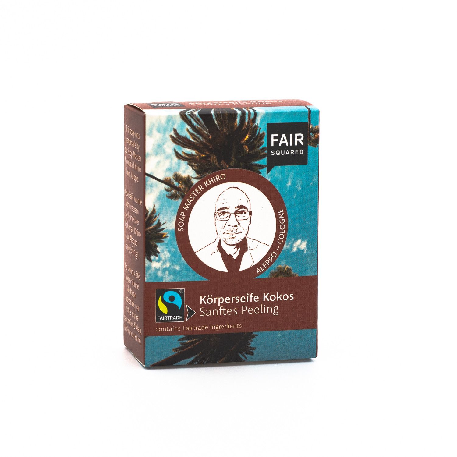 Kartonverpackung mit FAIR SQUARED Logo und Produktbezeichnung. Abbildung eines Mannes, Fairtrade-Siegel. Text: Körperseife Kokos Sanftes Peeling.