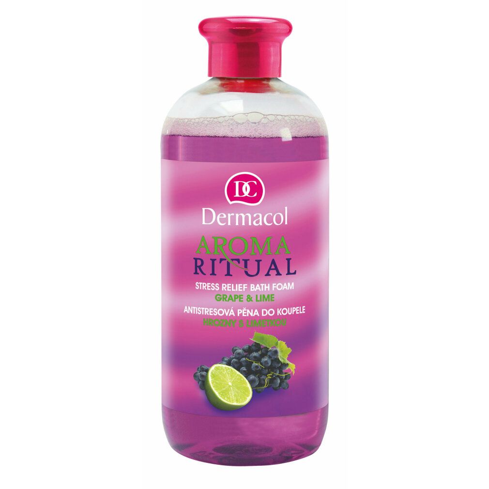 Flasche mit Dermacol Aroma Ritual Badezusatz. Rosa Deckel, lila Flüssigkeit, Etikett mit Trauben und Limette.