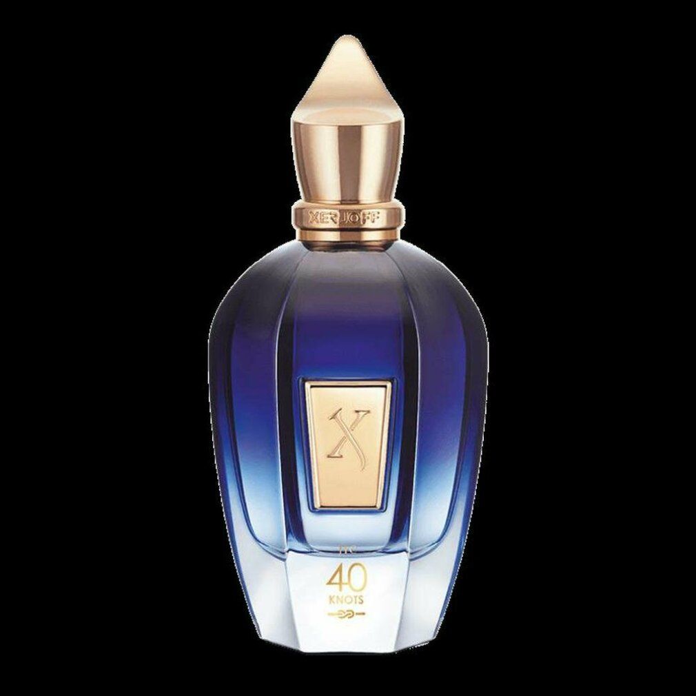 Blau-transparente Flasche mit goldfarbenem Verschluss. Goldfarbenes Etikett mit 'X' und '40 Knots'.