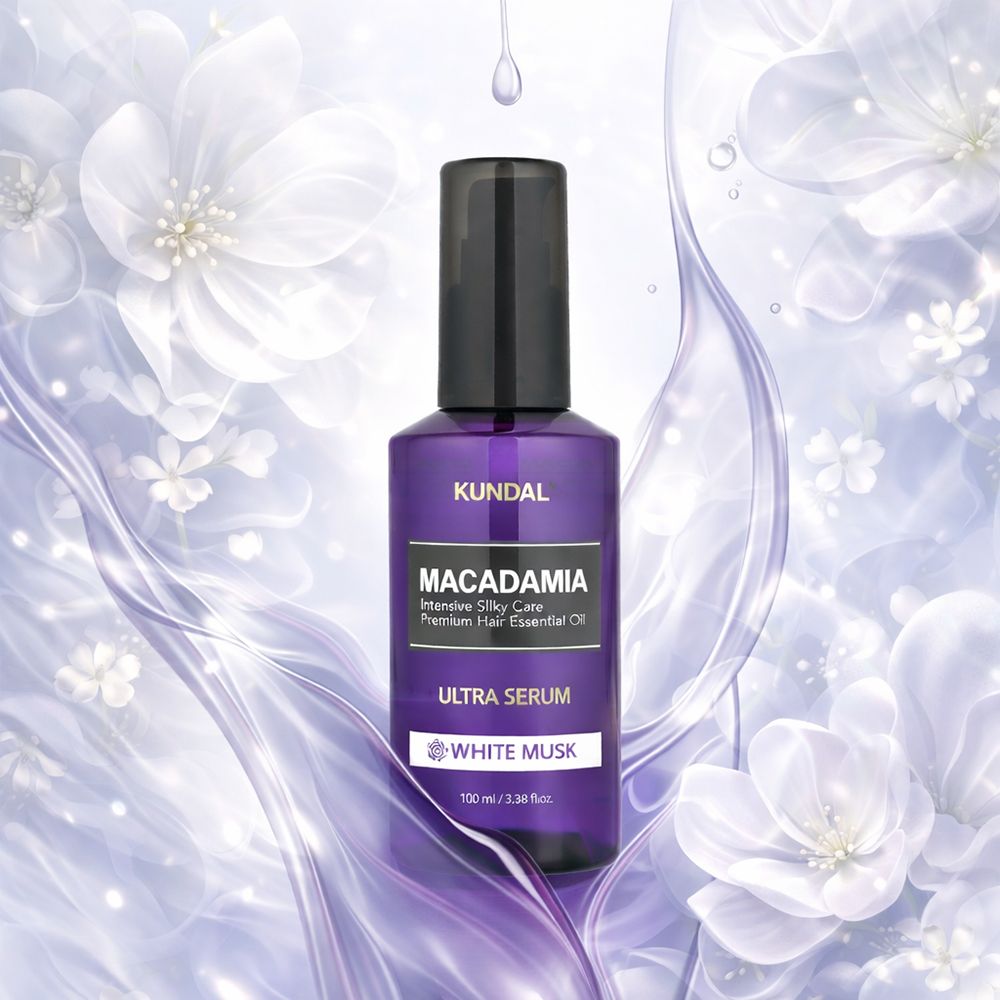 Violette Flasche mit schwarzem Deckel. Aufschrift: KUNDAL, MACADAMIA Ultra Serum, White Musk. 100 ml.