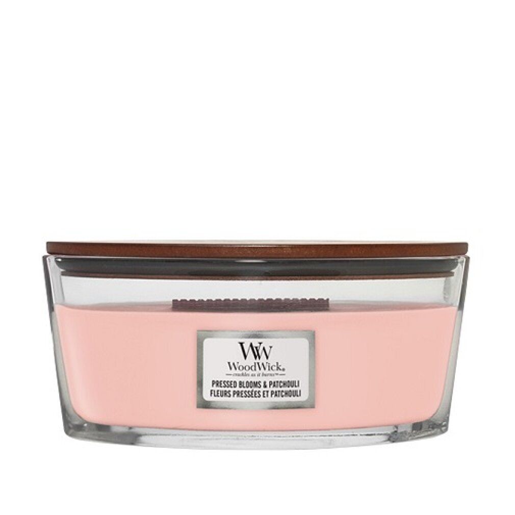 Kerze mit Holzdocht, rosa Wachs in Glasbehälter mit Holzdeckel. Label mit "WoodWick" und Produktbezeichnung.